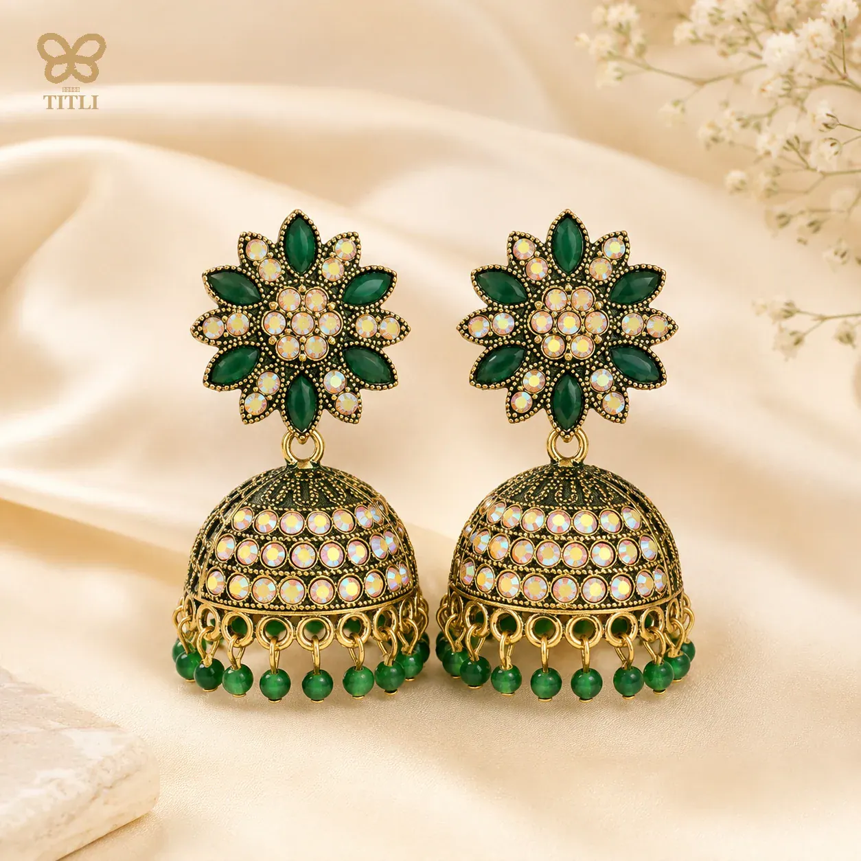 Green festive jhumka earrings